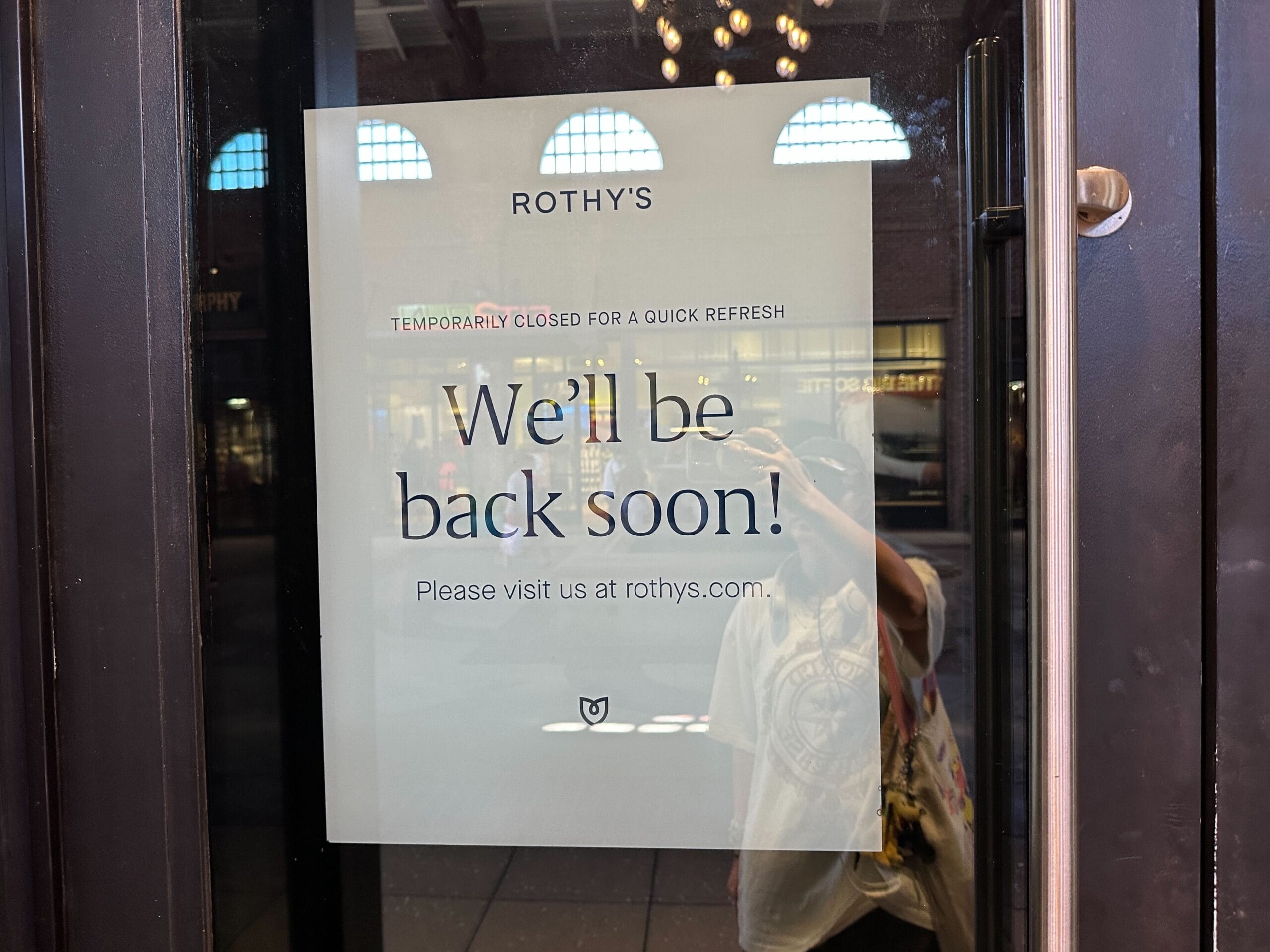 Sign on door: "We'll be back soon! Temporarily closed for refurbishment. Visit us at rothys.com.