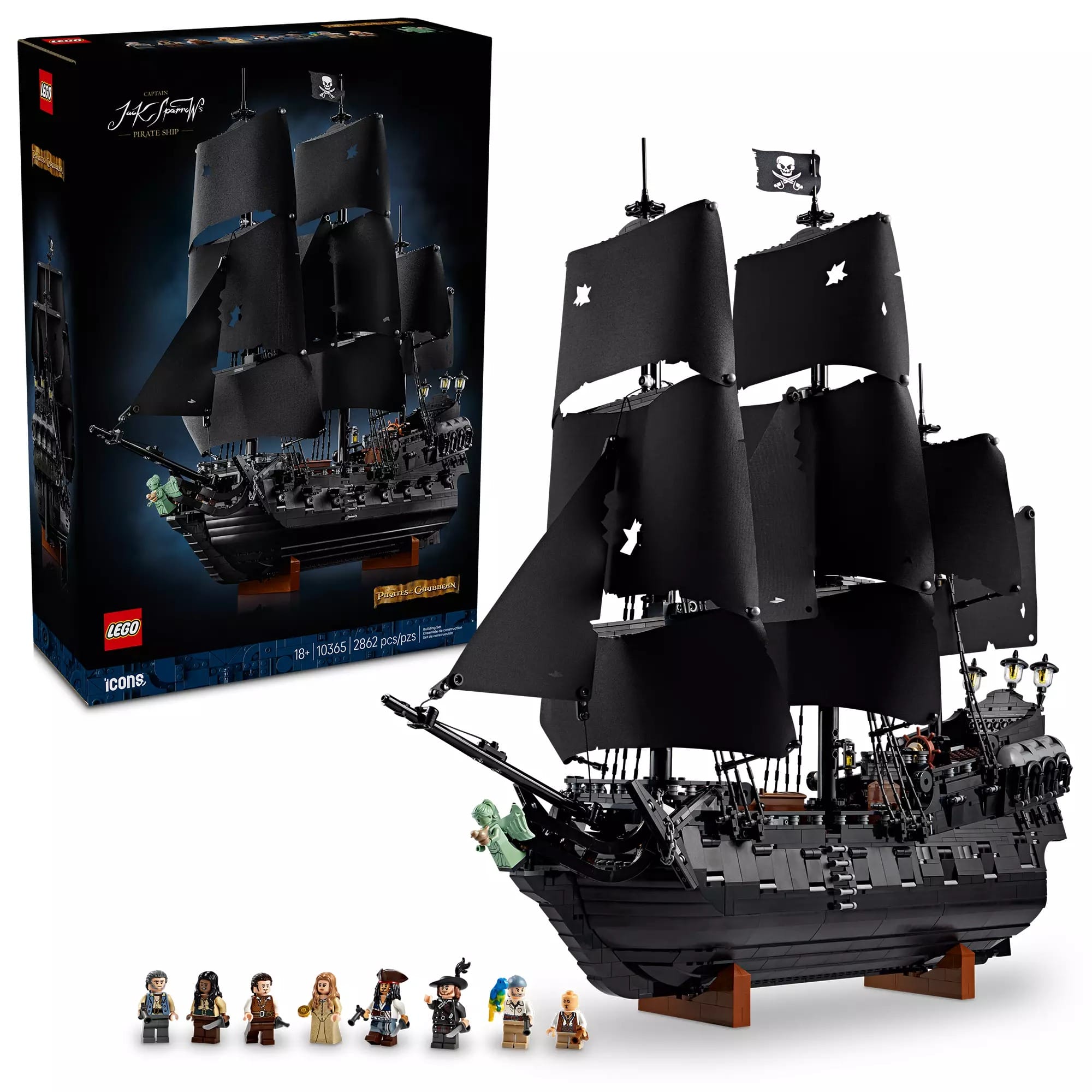 Black Pearl LEGO Pirates of the Caribbean Set with black sails, seven minifigures, and its box in the background.
