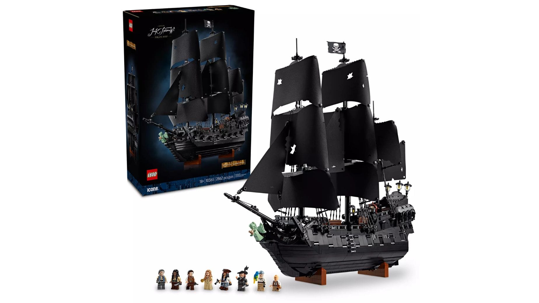 LEGO Pirates of the Caribbean ship with black sails, minifigures, and box featuring the assembled vessel on display.